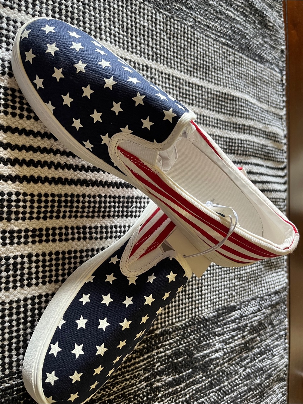 Patriotic American flag slip on tennis shoes.